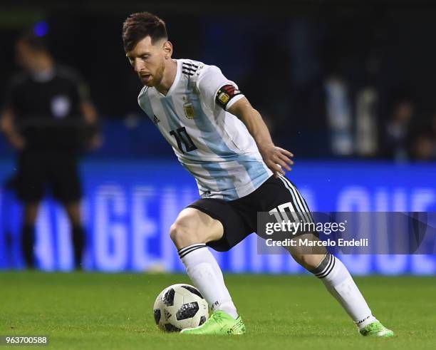 Lionel Messi of Argentina drives the ball during an international friendly match between Argentina and Haiti at Alberto J. Armando Stadium on May 29,...