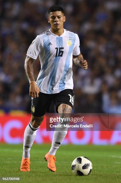Marcos Rojo of Argentina drives the ball during an international friendly match between Argentina and Haiti at Alberto J. Armando Stadium on May 29,...