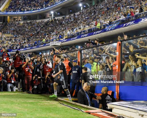 Lionel Messi of Argentina walks onto the field before an international friendly match between Argentina and Haiti at Alberto J. Armando Stadium on...