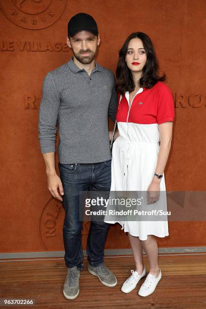 Actor Alban Lenoir and actress Anne Serra attends the 2018 French Open - Day Four at Roland Garros on May 30, 2018 in Paris, France.