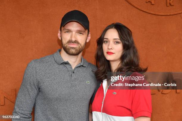 Actors Alban Lenoir and Anne Serra attend the 2018 French Open - Day Four at Roland Garros on May 30, 2018 in Paris, France.