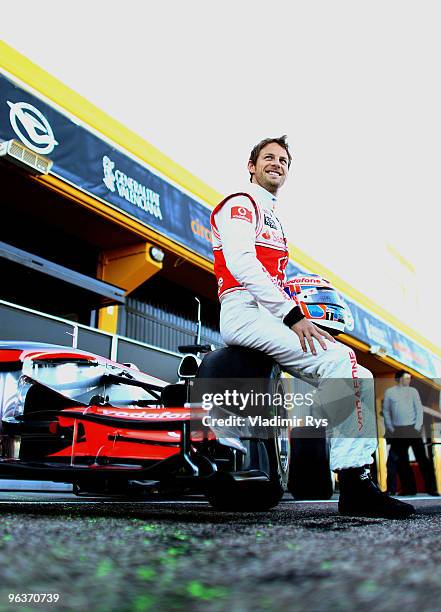 Jenson Button of Great Britain and McLaren poses for a photo during winter testing at the Ricardo Tormo Circuit on February 3, 2010 in Valencia,...