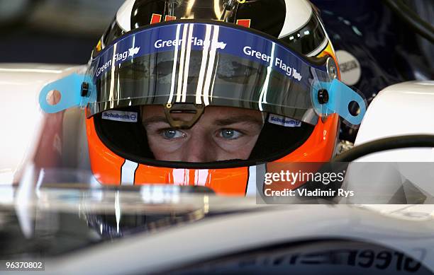 Nico Huelkenberg of Germany and Williams is seen in his car in the garage during winter testing at the Ricardo Tormo Circuit on February 3, 2010 in...