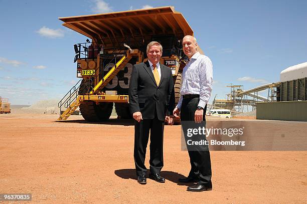 Colin Barnett, premier of Western Australia, left, and Richard T. O'Brien, chief executive officer of Newmont Mining Corp., pose for a photograph in...