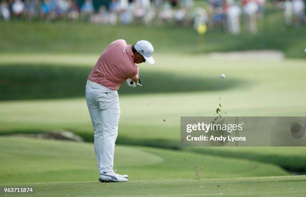 Rickie Fowler hits his second shot on the fifth hole during the Pro-Am of The Memorial Tournament Presented By Nationwide at Muirfield Village Golf...