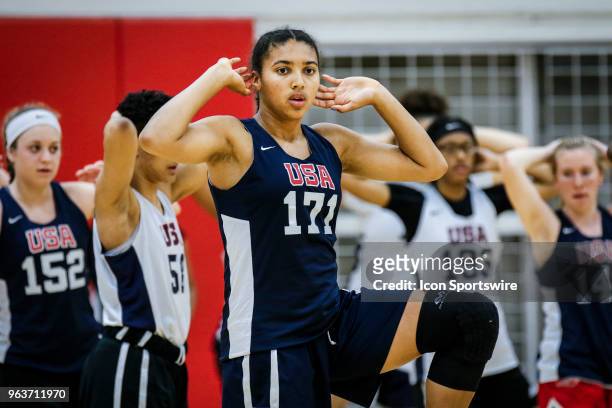 Azzi Fudd of Falls Church, Va. #171 stretches before participating in tryouts for the 2018 USA Basketball Women's U17 World Cup Team at the United...