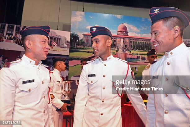 Cadets L to R - Ahmad Fahim Muslih from Afghanistan, Ibrahim Sadat from Afghanistan and T Zhumanaly from Kazakhstan share light moment during...