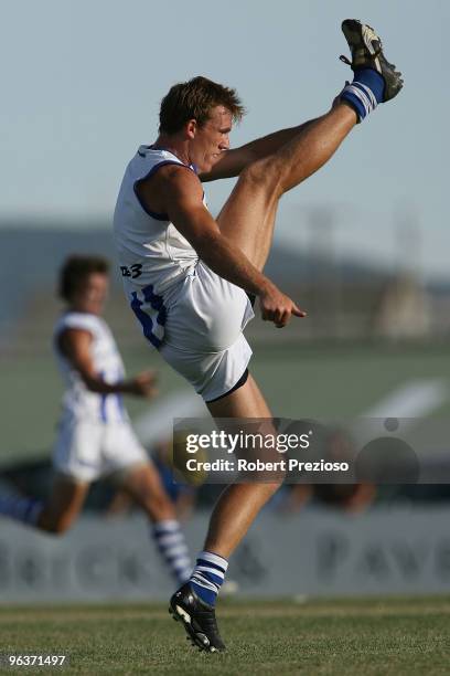 Drew Petrie kicks during a North Melbourne Kangaroos intra-club AFL match at XXX on February 3, 2010 in Ballarat, Australia.