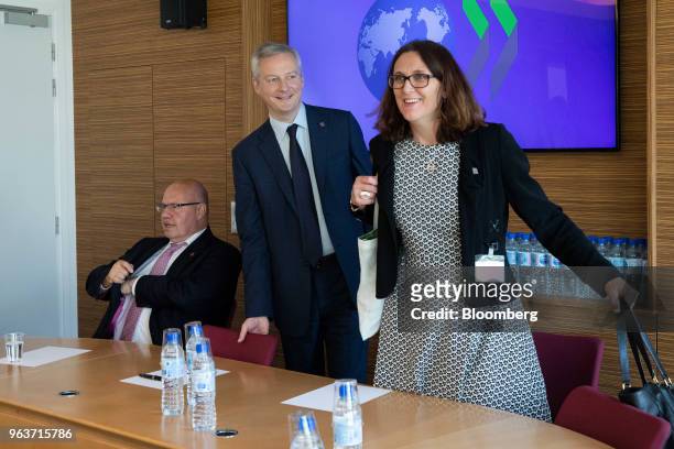 Peter Altmaier, Germany's economy minister, left, Bruno Le Maire, Frances finance minister, center, and Cecilia Malmstrom, European Union trade...