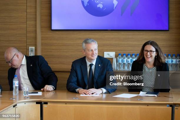 Peter Altmaier, Germany's economy minister, left, Bruno Le Maire, Frances finance minister, center, and Cecilia Malmstrom, European Union trade...