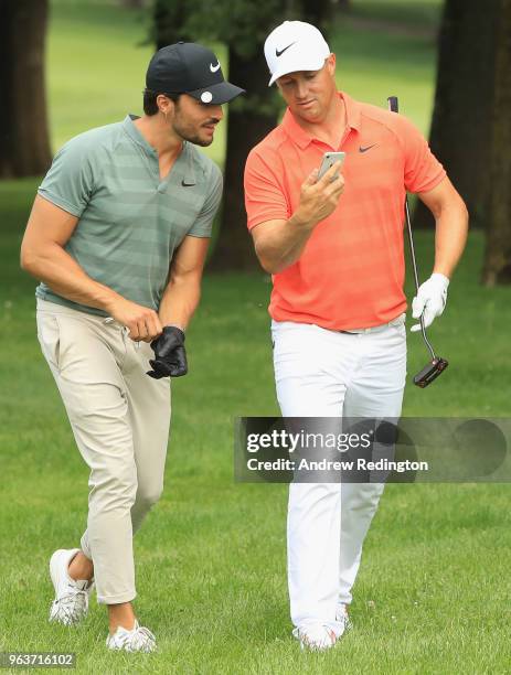 Alex Noren of Sweden is pictured with his Pro Am partner Mariano Di Vaio during the Pro Am event prior to the start of the Italian Open at Gardagolf...