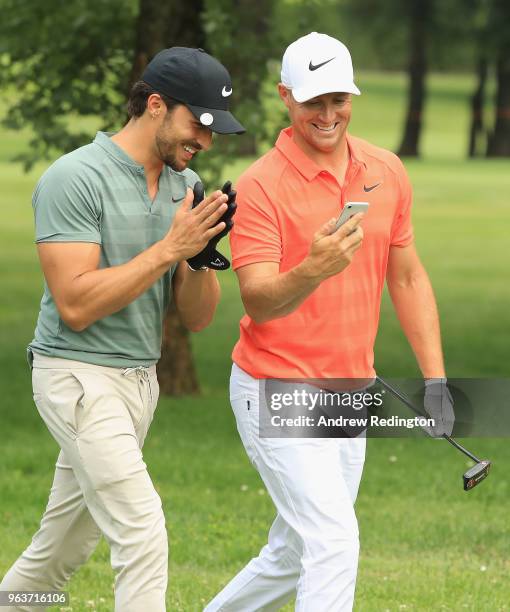 Alex Noren of Sweden is pictured with his Pro Am partner Mariano Di Vaio during the Pro Am event prior to the start of the Italian Open at Gardagolf...