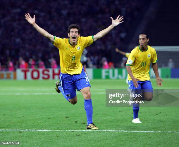 Kaka of Brazil celebrates the first - and only - goal with teammate Ronaldinho during the FIFA World Cup Group F match between Brazil and Croatia at...