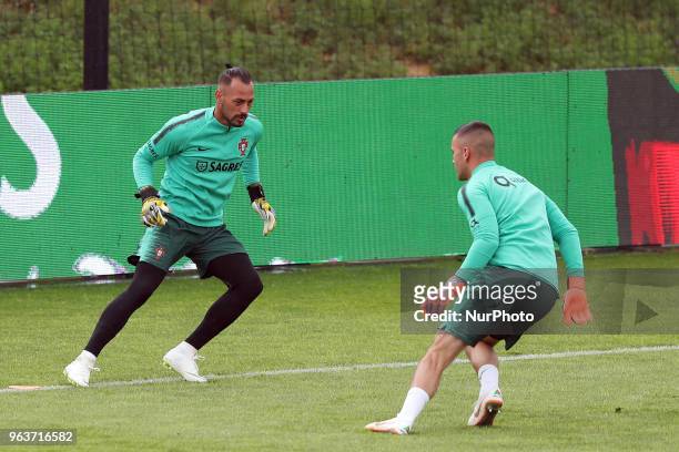 Portugal's goalkeeper Beto and Portugal's goalkeeper Anthony Lopes in action during a training session at Cidade do Futebol training camp in Oeiras,...