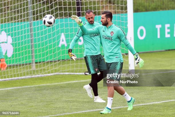 Portugal's goalkeeper Rui Patricio and Portugal's goalkeeper Beto in action during a training session at Cidade do Futebol training camp in Oeiras,...