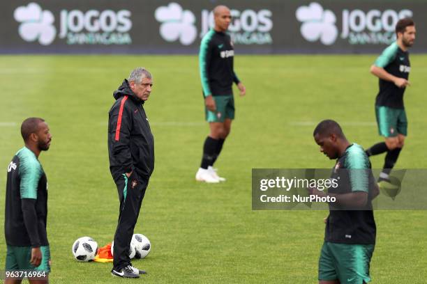 Portugal's head coach Fernando Santos looks on during a training session at Cidade do Futebol training camp in Oeiras, outskirts of Lisbon, on May 30...