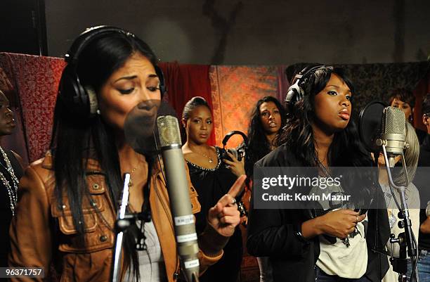 Singer Nicole Scherzinger and Jennifer Hudson perform at the "We Are The World 25 Years for Haiti" recording session held at Jim Henson Studios on...