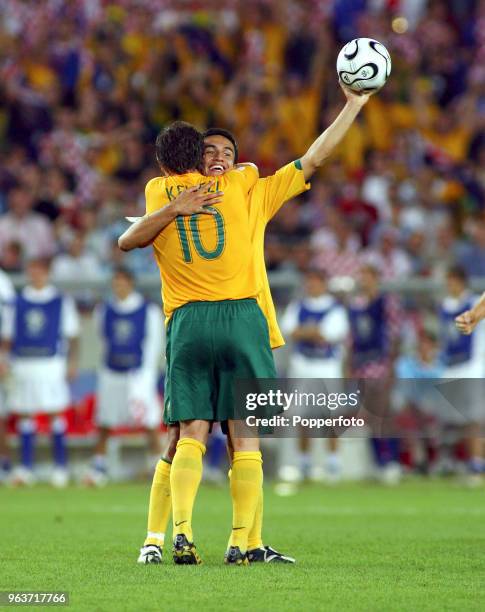 Harry Kewell of Austalia celebrates with teammate Tim Cahill at the final whistle of the FIFA World Cup Group F match between Croatia and Australia...