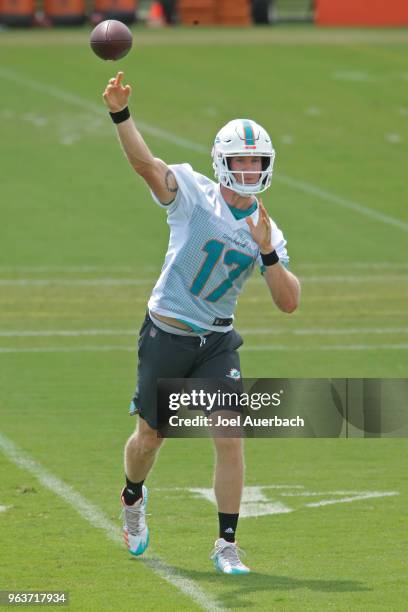 Ryan Tannehill of the Miami Dolphins throws the ball during the teams training camp on May 30, 2018 at the Miami Dolphins training facility in Davie,...