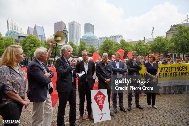 Amnesty international director Eduard Nazarski speaks out as human rights group Amnesty International hand over a petition signed by more the 68,000...