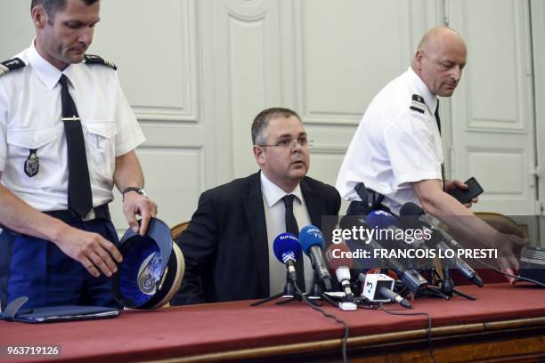 French prosecutor Baptiste Porcher , gendarme officers Lieutenant colonel Paris and colonel Metras, arrive for a press conference on May 30 ,2018 at...
