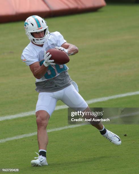 Danny Amendola of the Miami Dolphins catches the ball during the teams training camp on May 30, 2018 at the Miami Dolphins training facility in...