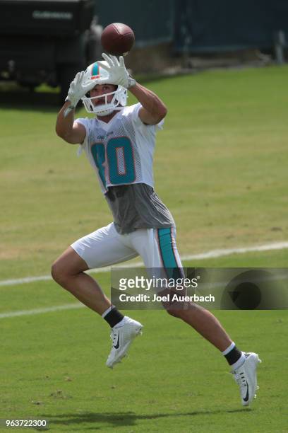 Danny Amendola of the Miami Dolphins catches the ball during the teams training camp on May 30, 2018 at the Miami Dolphins training facility in...