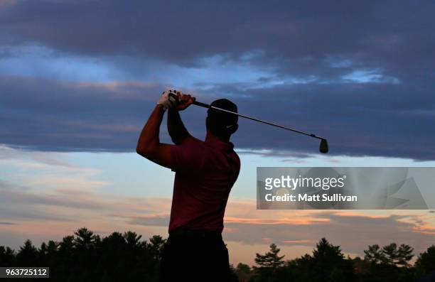 Tiger Woods warms up on the range prior to the Pro-Am prior to The Memorial Tournament presented by Nationwide at Muirfield Village Golf Club on May...