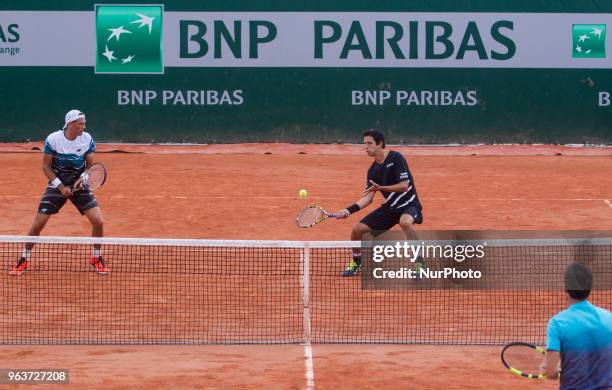 Lukasz Kubot of Poland and Marcelo Melo of Brazil returns the ball to Márton Fucsovics of Hungary and Marco Cecchinato of Italy during the second...