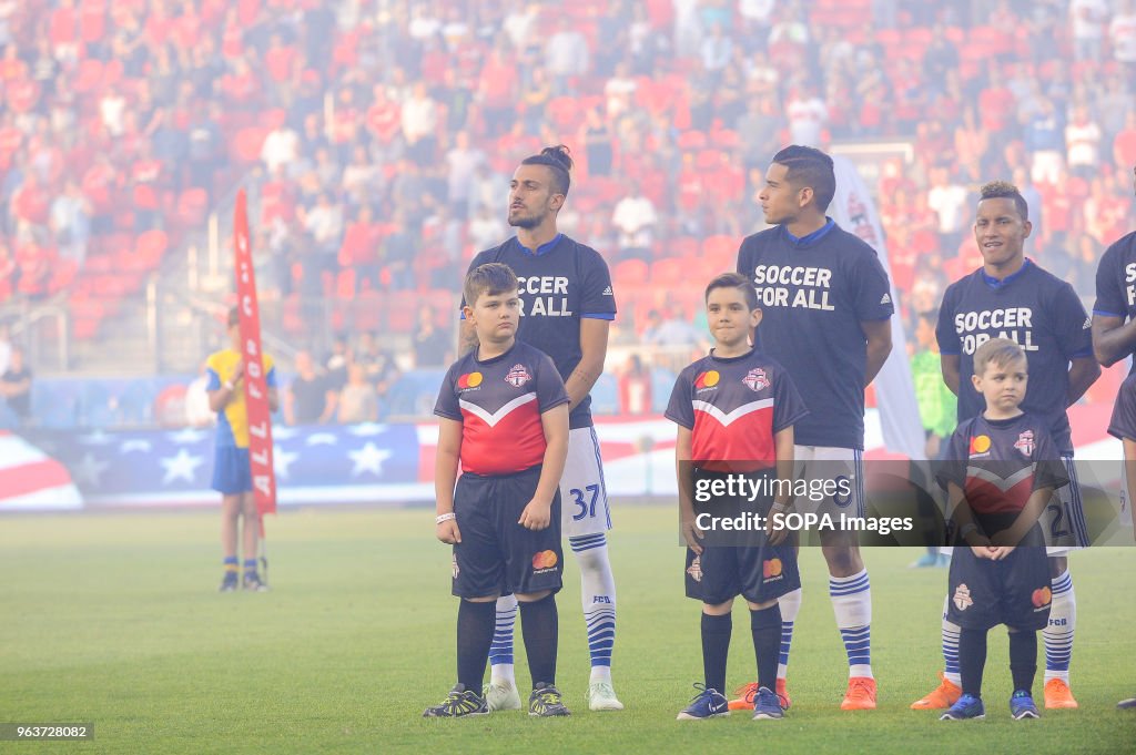 Maximiliano Urruti (#37), Victor Ulloa (#8) and Michael...