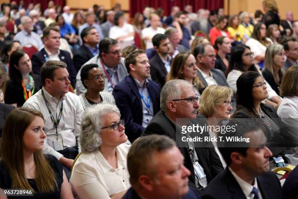 Shareholders and associates listen at the Walmart annual formal business and shareholders meeting on May 30, 2018 in Rogers, Arkansas. Walmart...