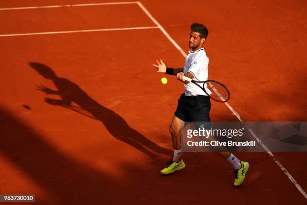 Martin Klizan of Slovakia plays a forehand during his mens singles second round match against Gael Monfils of France during day four of the 2018...