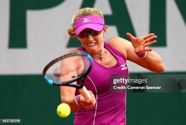 Anastasia Rodionova of Australia, partner of Nadiia Kichenok of Ukraine plays a forehand during the ladies doubles first round match against Many...