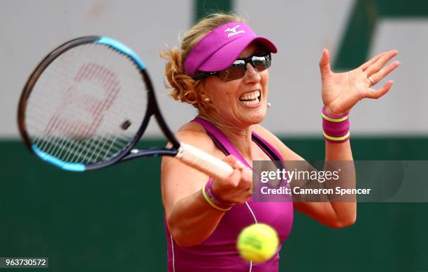 Anastasia Rodionova of Australia, partner of Nadiia Kichenok of Ukraine plays a forehand during the ladies doubles first round match against Many...