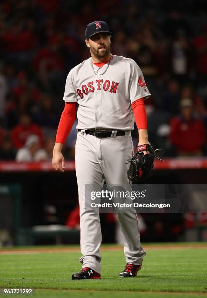 Pitcher Heath Hembree of the Boston Red Sox looks on after the seventh inning during the MLB game against the Los Angeles Angels of Anaheim at Angel...