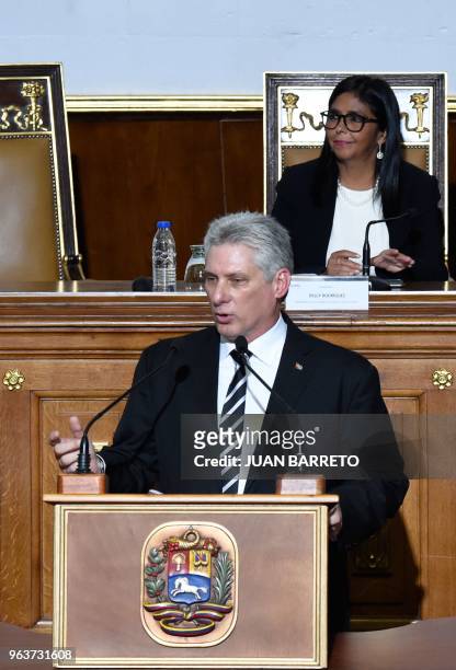 Cuban President Miguel Diaz-Canel applauds as he delivers a speech before the Venezuelan Constituent Assembly, presided by Delcy Rodriguez , in...