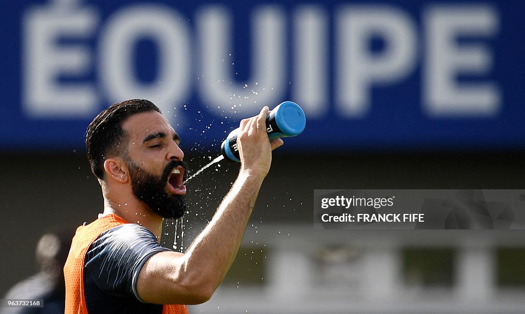 Adil Rami Fra France's defender Adil Rami drinks during a training session in... News ...