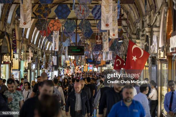 People shop in Istanbul's famous Grand Bazaar on May 30, 2018 in Istanbul, Turkey. Fears are growing that Turkey's economy is heading into crisis as...