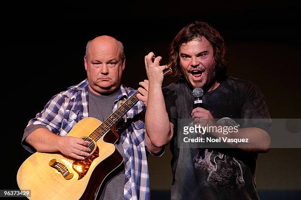 Kyle Gass and Jack Black of Tenacious D perform at the Stand With Haiti benefit concert at The Wiltern on February 2, 2010 in Los Angeles, California.