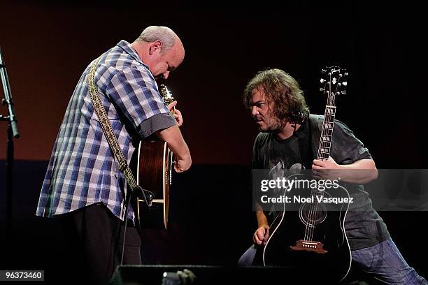 Kyle Gass and Jack Black of Tenacious D perform at the Stand With Haiti benefit concert at The Wiltern on February 2, 2010 in Los Angeles, California.