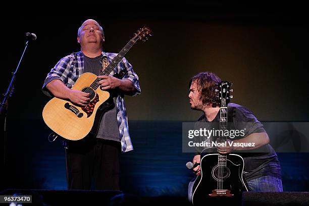 Kyle Gass and Jack Black of Tenacious D perform at the Stand With Haiti benefit concert at The Wiltern on February 2, 2010 in Los Angeles, California.