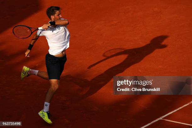 Martin Klizan of Slovakia plays a forehand during his mens singles second round match against Gael Monfils of France during day four of the 2018...