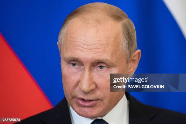 Russian President Vladimir Putin speaks during a joint press conference with Bulgarian Prime Minister following their talks in the Kremlin in Moscow...