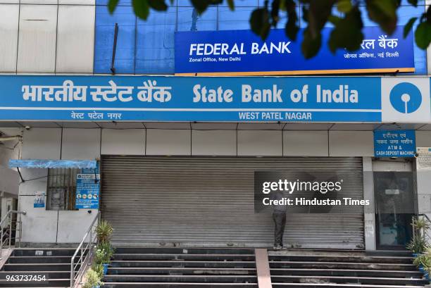 General view of closed State Bank of India as employees of government banks went on a strike, at Patel Nagar on May 30, 2018 in New Delhi, India....