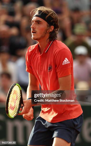 Stefanos Tsitsipas of Greece looks on during the mens singles second round match against Dominic Thiem of Austria during day four of the 2018 French...