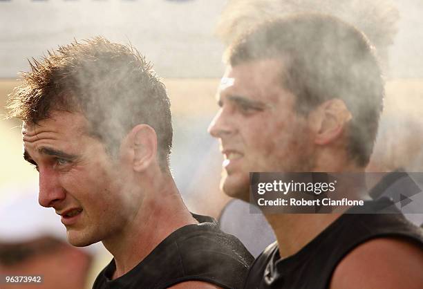 Jobe Watson and Jay Neagle attempt to cool down during an Essendon Bombers intra-club AFL match at Deakin Oval on February 3, 2010 in Shepparton,...