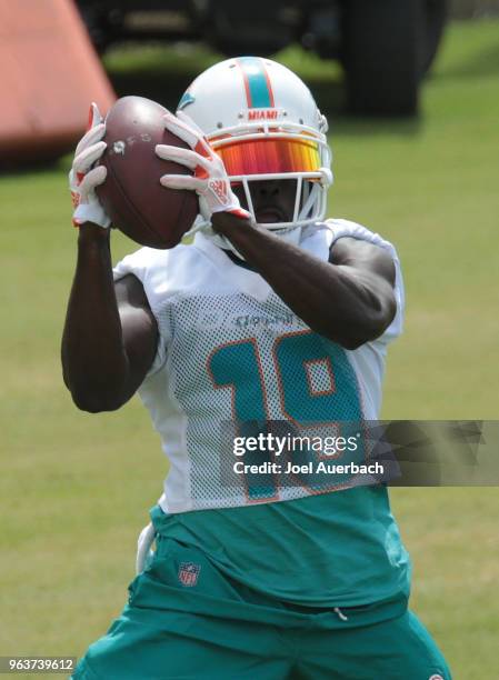 Jakeem Grant of the Miami Dolphins catches the ball during the teams training camp on May 30, 2018 at the Miami Dolphins training facility in Davie,...