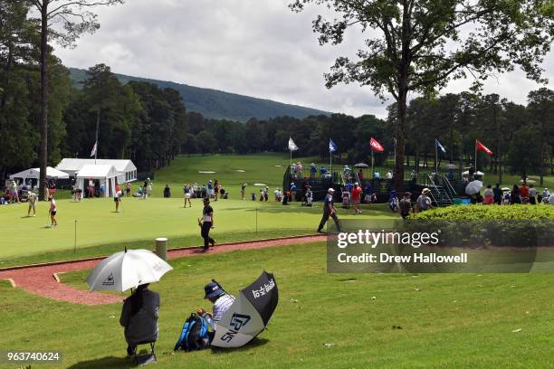 Fans look on as players warmup during a practice round prior to the 2018 U.S. Women's Open at Shoal Creek on May 30, 2018 in Shoal Creek, Alabama.