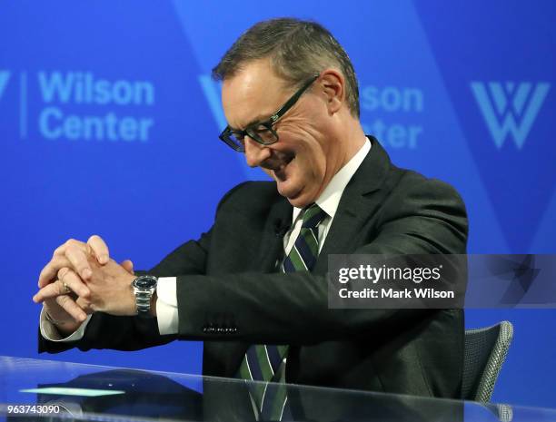 Ambassador to the United States David O'Sullivan reacts to his introduction during a forum to discuss the U.S. Decision to withdraw from the Iran...