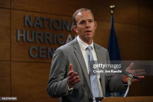 Brock Long, FEMA's director, speaks to the media during a visit to the National Hurricane Center on May 30, 2018 in Miami, Florida. Mr. Long urged...